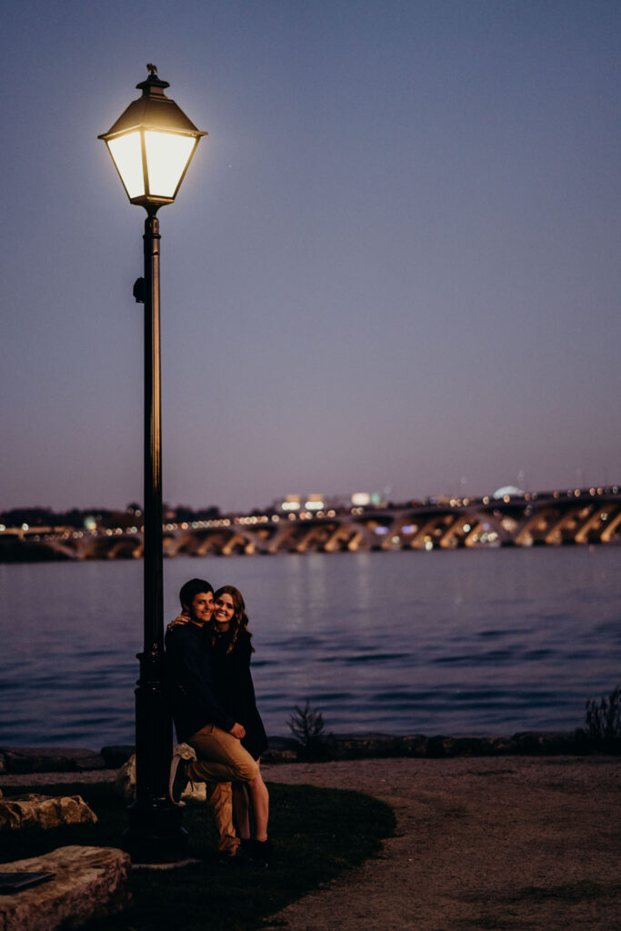 Couple have a moment by a streetlight