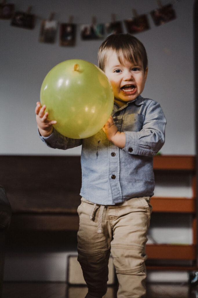 Child holding ballon